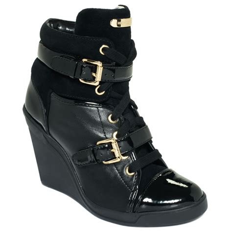 schwarze sneaker michael kors|Michael Kors black wedge sneakers.